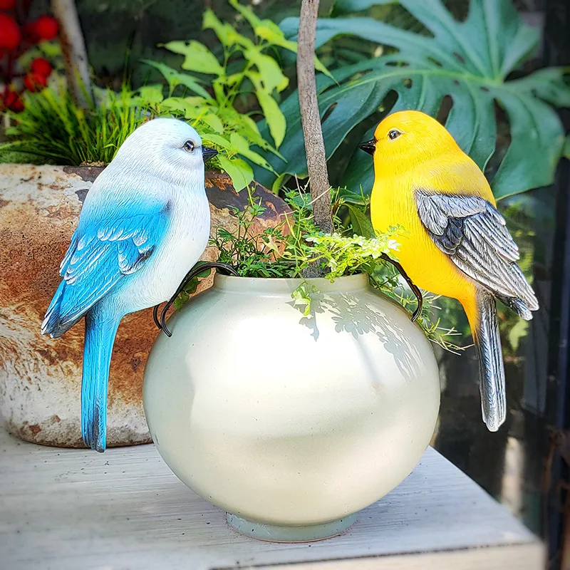 Dekorativer Kunstvogel aus Harz – Bild 8