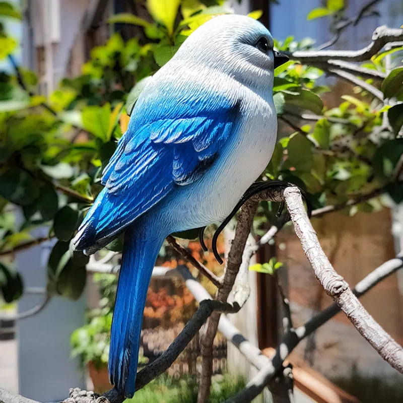 Dekorativer Kunstvogel aus Harz – Bild 4